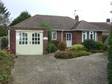 A mature detached bungalow with secluded garden off a 'no' through road in this